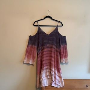 A coveted clothing brand dress with a cold shoulder long sleeve and purple ombré